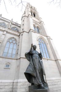 A statue of St. John Paul II stands outside the Cathedral Basilica of the Immaculate Conception downtown.