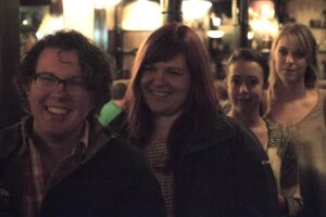 A crowd listens to speakers at the monthly Theology on Tap series at Katie Mullen's Irish Pub and Restaurant in Denver.
