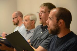 The music score for Our Lady of Mount Carmel July 16 feast day Mass includes Gregorian chant and polyphony sung by a choir of men and women in Latin and Greek.