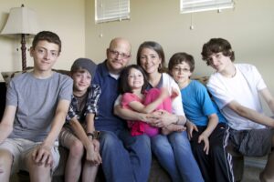 Greg and Jennifer Willits with their five children.