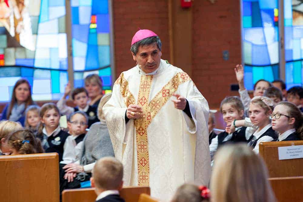 Bishop Jorge Rodriguez celebrates mass for the students at St Mary's of Littleton for Catholic Schools Week. February 2, 2017: St. Mary's of Littleton school Littleton, Colorado Photo by Andrew Wright/Denver Catholic