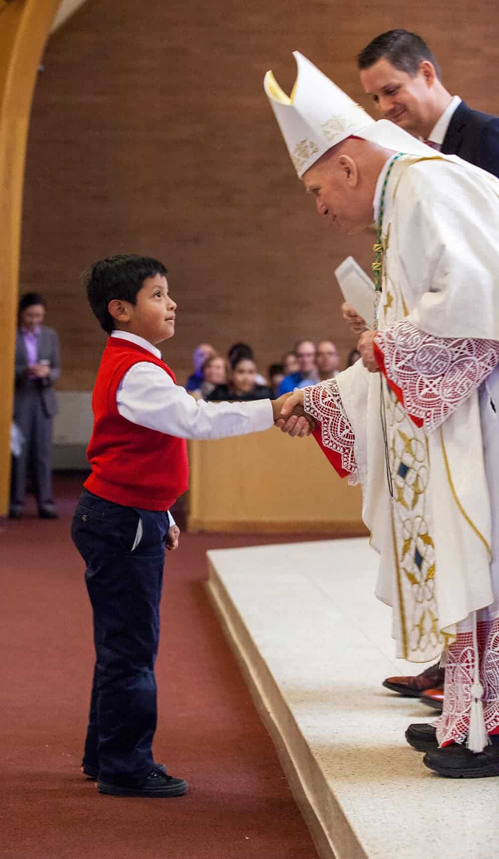 Archbishop Samuel J Aquila celebrates mass and visits the school, February 2, 2017: Sacred Heart of Jesus school Boulder, Colorado Photo by Andrew Wright/Denver Catholic