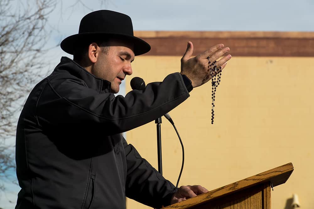 DENVER, CO - FEBRUARY 11: Fr. Andre Mahanna, pastor of St. Rafka Maronite Catholic Church, leads the crowd in prayer during the rally to defund Planned Parenthood across the street from Planned Parenthood of the Rocky Mountains on February 11, 2017, in Denver, Colorado. (Photo by Anya Semenoff/Denver Catholic)