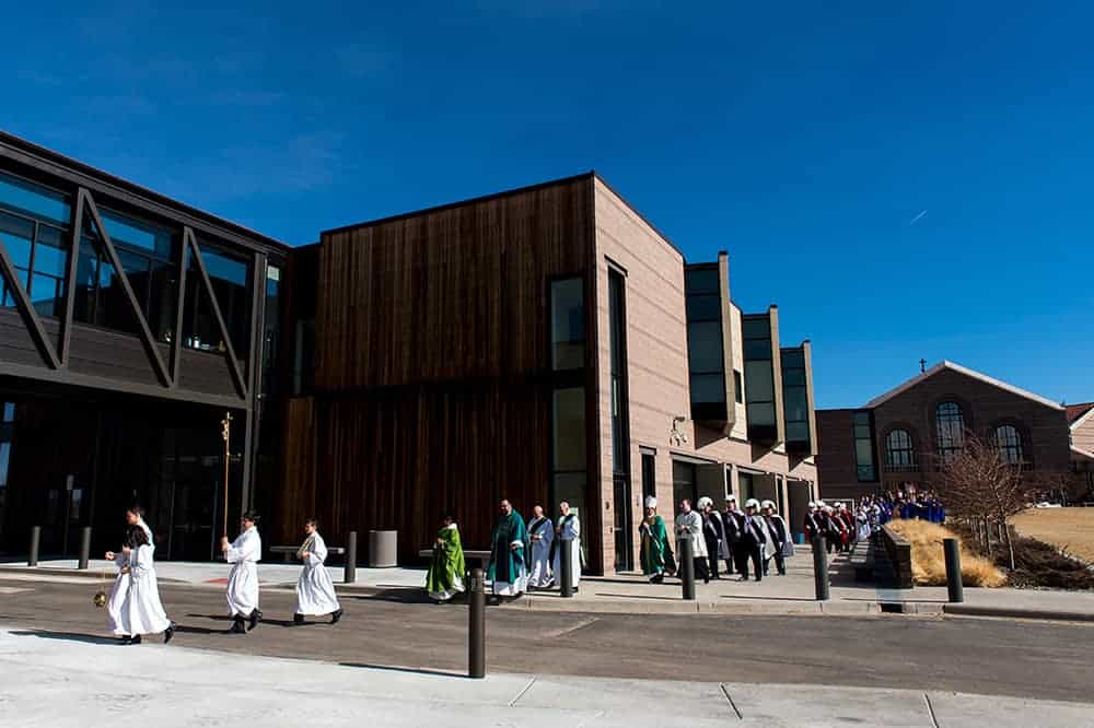 FOXFIELD, CO - JANUARY 29: A procession leaves mass and walks to the new west wing of the St. Joseph Ministry Center and School Building for a dedication blessing at Our Lady of Loreto Catholic Parish and School on January 29, 2017, in Foxfield, Colorado. (Photo by Anya Semenoff/Denver Catholic)