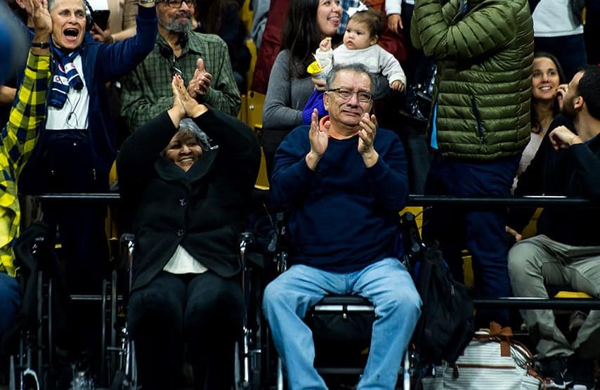 People from California cheer and a man cries after Way founder Kiko Arguello is introduced during a Neocatechumenal Way Gathering at the Coors Events Center on March 11 in Boulder. (Photo by Daniel Petty/for Denver Catholic)