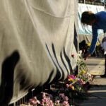 DENVER, CO – JANUARY 18: A woman places flowers outside Planned Parenthood during a prayer event to mark the 41st anniversary of Roe v. Wade on January 18, 2014, in Denver, Colorado. (Photo by Anya Semenoff/Denver Catholic Register)