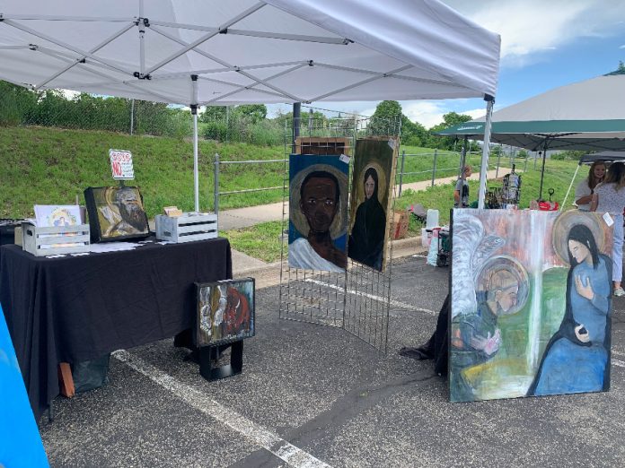 Religious paintings by Thomason Arts for sale at the Holy Name Makers Market in June. Photo credit: Holy Name Parish